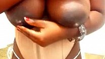 Kinky black MILF with massive lactating boobs